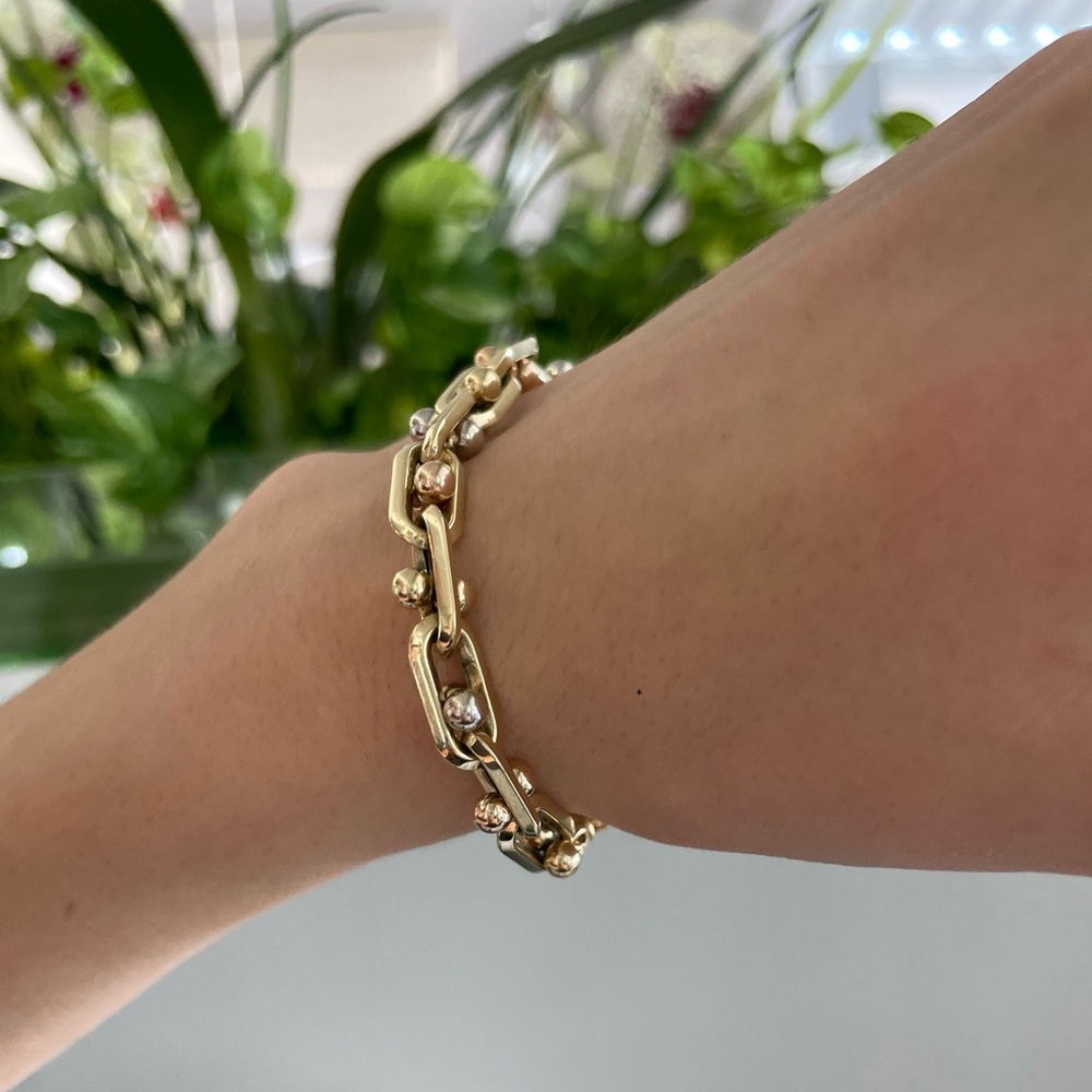 Very stylish 14k tricolor solid gold Roberto Bravo bracelet